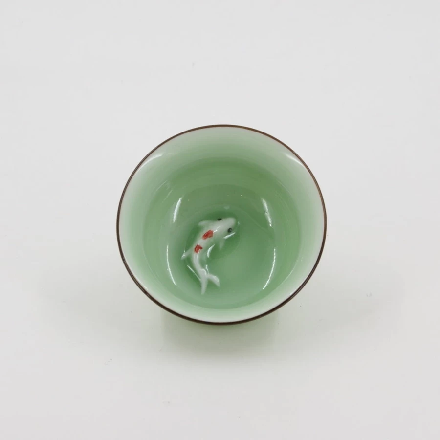 "The Chinese Tea Shop Porcelain Celadon Goldfish Tea Cup – Handcrafted Ceramic Tea Cup"