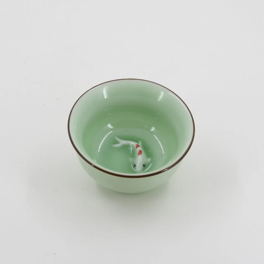 "The Chinese Tea Shop Porcelain Celadon Goldfish Tea Cup – Handcrafted Ceramic Tea Cup"