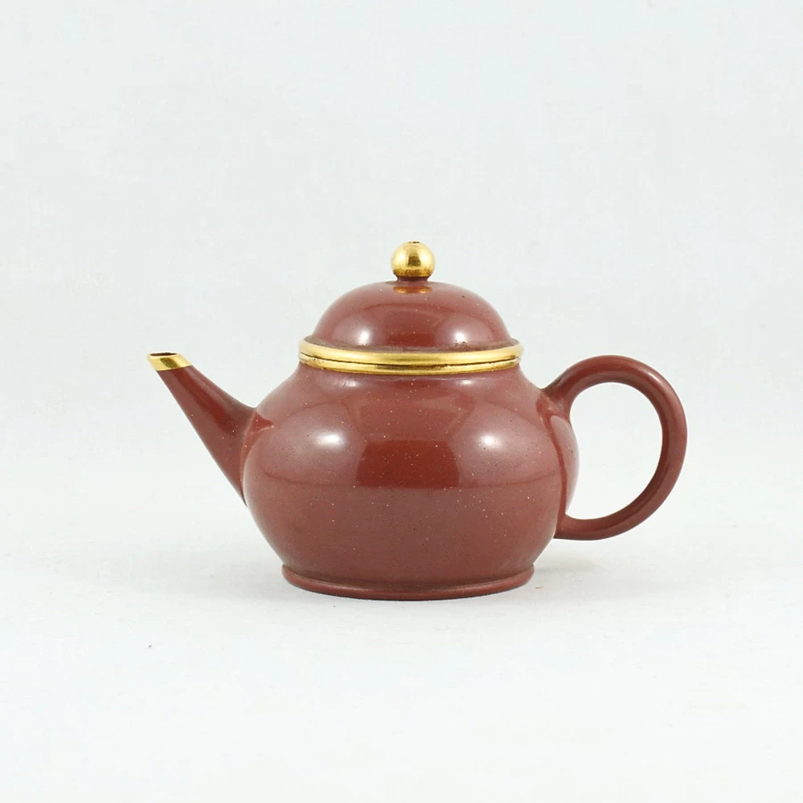 "The Chinese Tea Shop Yixing Purple Clay Shuimo Polished Pear-Shaped Teapot with Gold Accent"