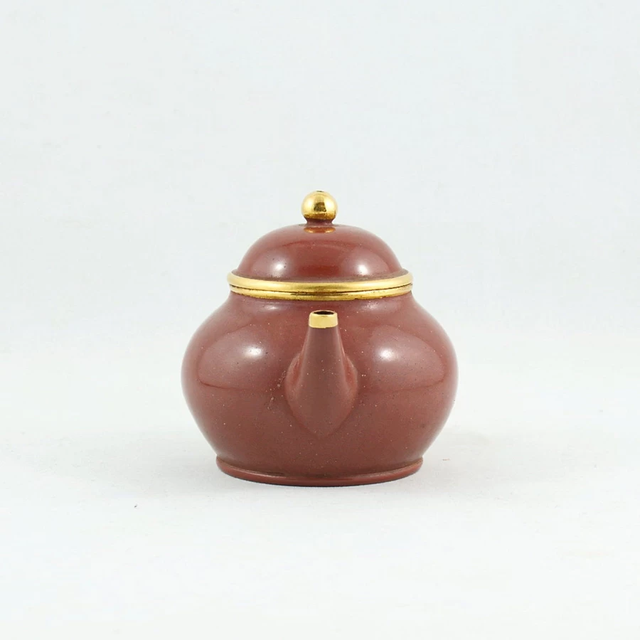 "The Chinese Tea Shop Yixing Purple Clay Shuimo Polished Pear-Shaped Teapot with Gold Accent"